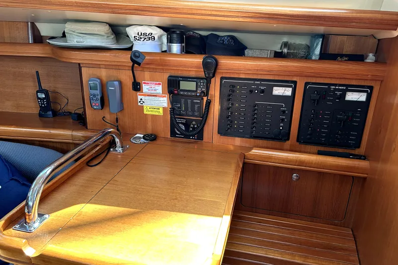 Slide: The Image of Control panel of a 2007 Hunter 41 Deck Salon with navigation instruments. - 13