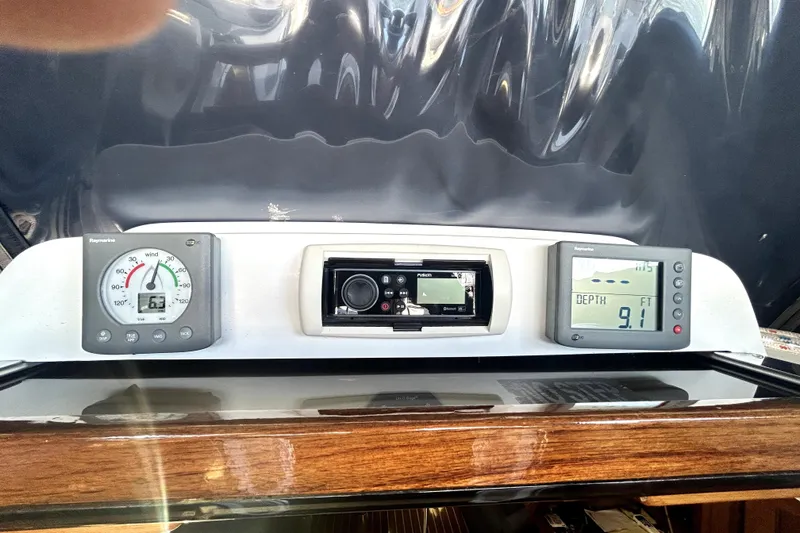 Slide: The Image of Galley kitchen in 2007 Hunter 41 Deck Salon yacht with stove, microwave, and sink. - 18