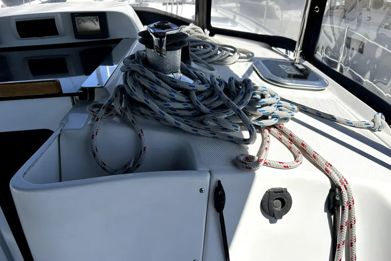 Slide: The Image of Interior of 2007 Hunter 41 Deck Salon yacht bathroom with wooden accents. - 26