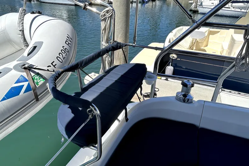 Slide: The Image of 2007 Hunter 41 Deck Salon cockpit with navigation equipment and steering wheel. - 29