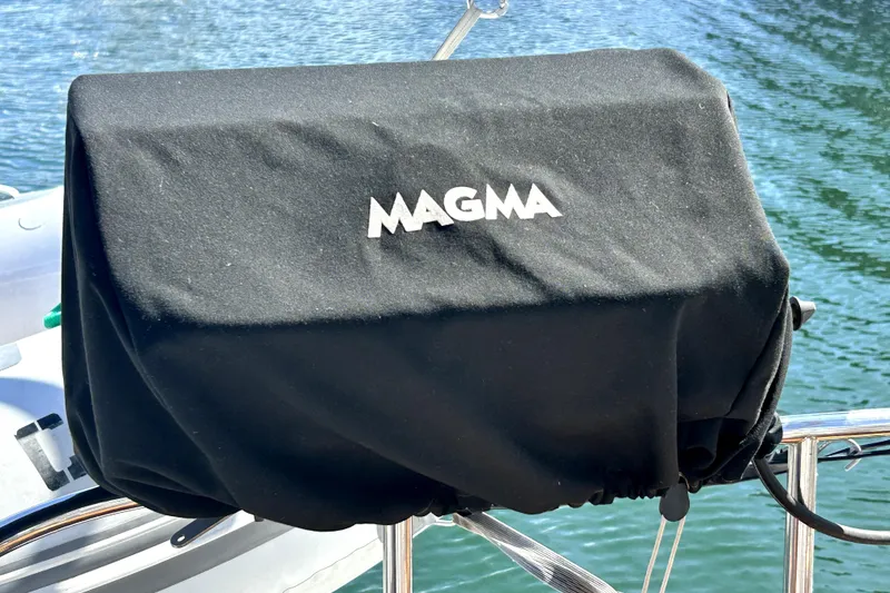 Slide: The Image of Anchor and rigging on a 2007 Hunter 41 Deck Salon sailboat at a marina. - 33