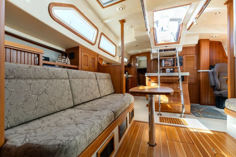 Slide: The Image of Luxurious interior of 2008 Island Packet 465 yacht with elegant wood finishes and comfortable seating. - 39