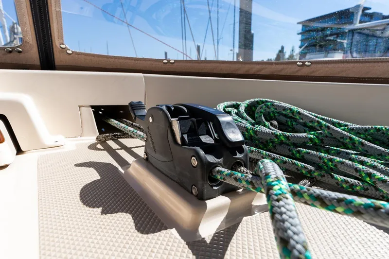 Slide: The Image of Close-up of sailing ropes and winch on 2008 Island Packet 465 yacht deck. - 49