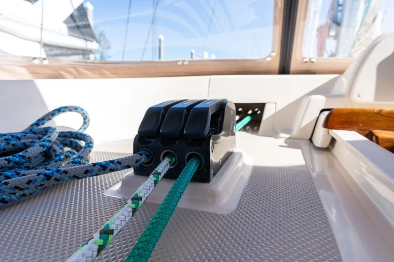 Slide: The Image of Close-up of sailing ropes and cleats on a 2008 Island Packet 465 yacht deck. - 50