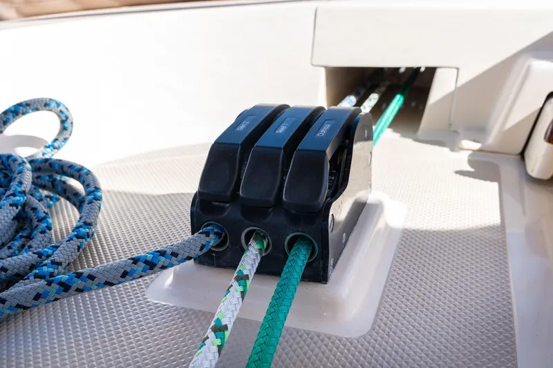Slide: The Image of Close-up of rope clutches on a 2008 Island Packet 465 sailboat deck. - 51