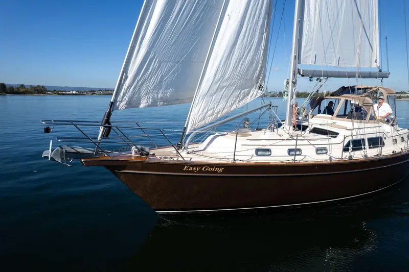 Slide: The Image of Sailing yacht Island Packet 465, 2008 model, cruising on calm waters under clear skies. - 71