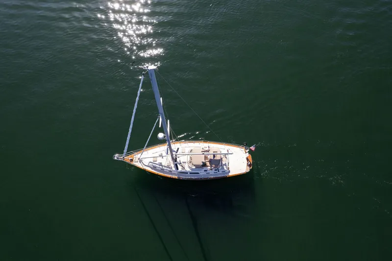 Slide: The Image of Aerial view of 2008 Island Packet 465 sailboat on calm water. - 73
