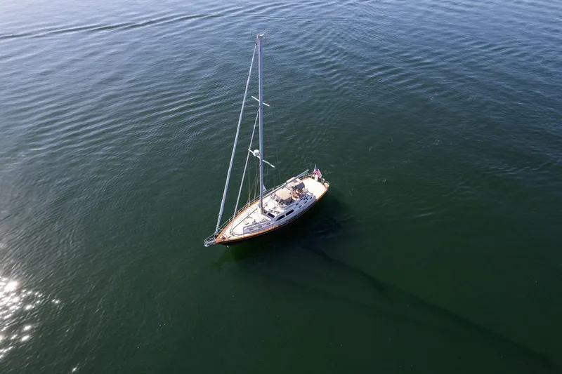 Slide: The Image of Aerial view of 2008 Island Packet 465 sailboat on calm water. - 74