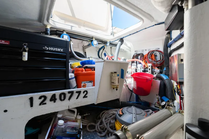 Slide: The Image of Interior of 2008 Island Packet 465 sailboat with tools and equipment storage. - 86