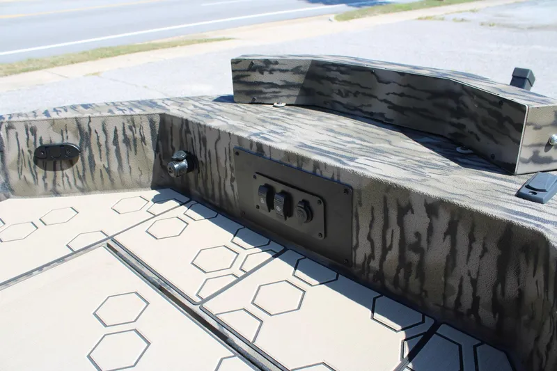 Slide: The Image of 2026 Excel Tomahawk 183 boat interior with hexagonal pattern design. - 9