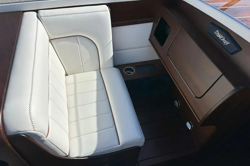 Slide: The Image of Luxurious interior seating of 2023 StanCraft 380 Rivelle boat with elegant wood finish. - 13