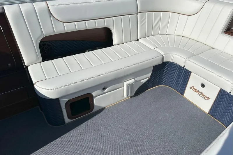 Slide: The Image of Luxurious interior seating of 2023 StanCraft 380 Rivelle boat with white upholstery. - 15