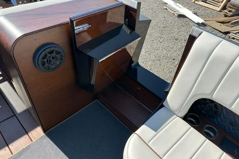 Slide: The Image of Interior of 2023 StanCraft 380 Rivelle boat with luxurious seating and wood finish. - 16