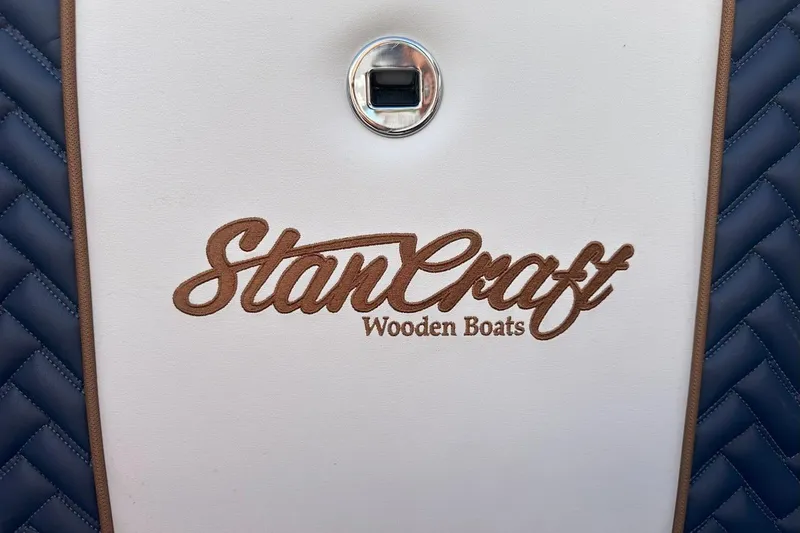 Slide: The Image of StanCraft 380 Rivelle 2023 logo on white and blue boat upholstery. - 21