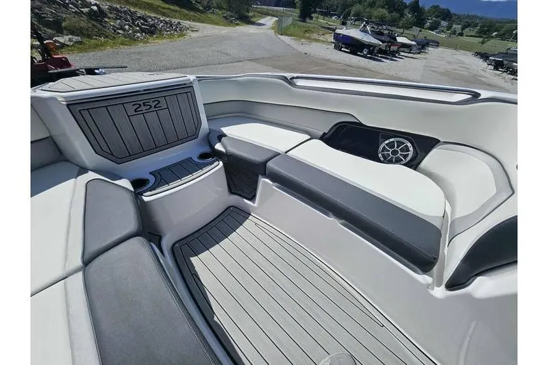 Slide: The Image of 2023 Yamaha Boats 252SD interior with sleek seating and modern design. - 5