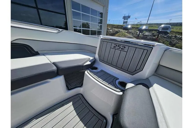 Slide: The Image of 2023 Yamaha Boats 252SD interior with sleek seating and modern design. - 6