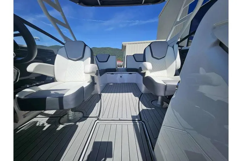Slide: The Image of 2023 Yamaha Boats 252SD interior with modern seating and sleek design. - 9