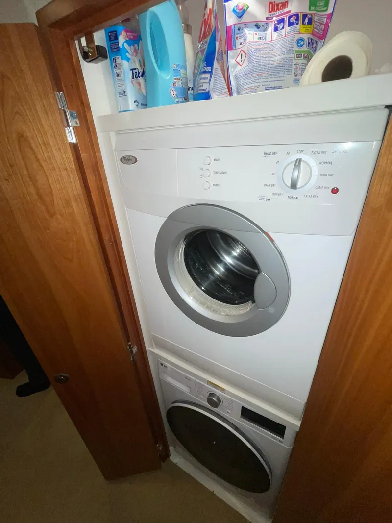 Slide: The Image of Stacked washer and dryer in Hatteras GT63 yacht, 2013 model. - 16