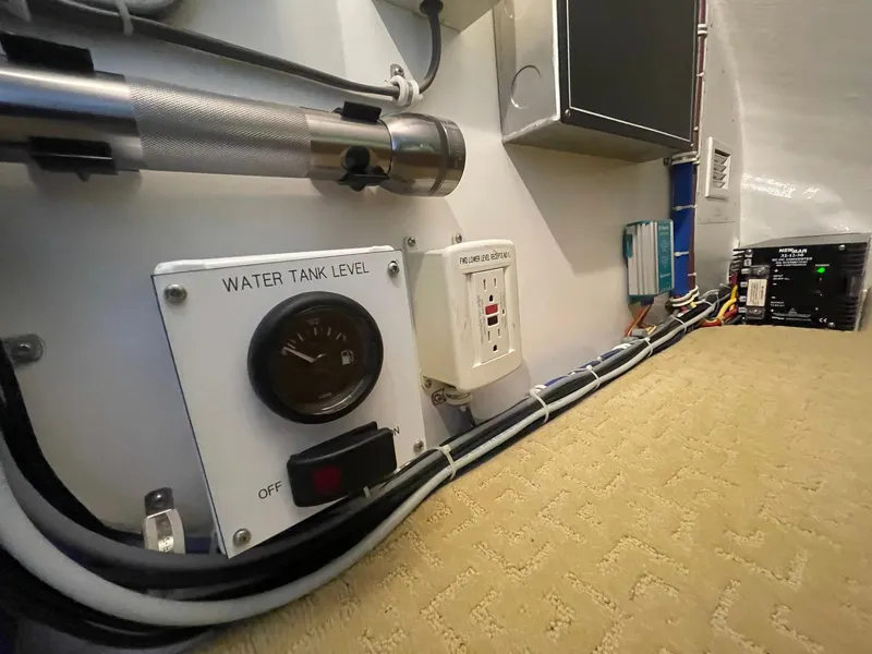 Slide: The Image of Control panel and wiring inside a 2013 Hatteras GT63 yacht. - 30
