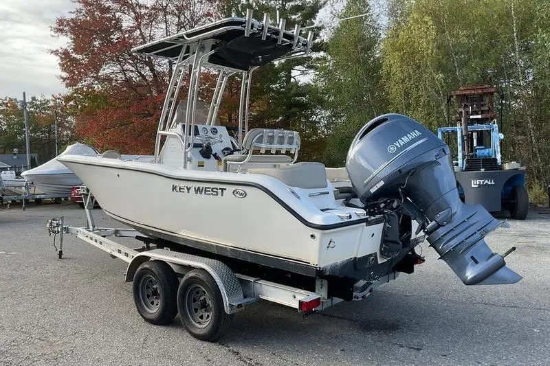 Slide: The Image of 2023 Key West 203 FS boat on trailer with Yamaha outboard motor. - 9