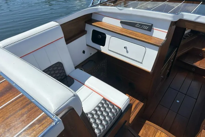 Slide: The Image of Interior of 2020 StanCraft 290 Rivelle boat with elegant wood and leather seating. - 6