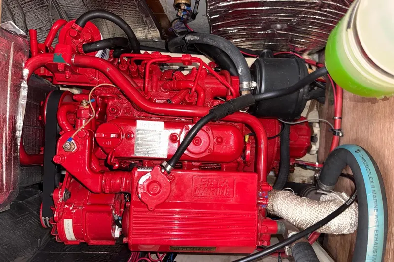 Slide: The Image of Red Beta Marine engine in a 1988 Sparkman & Stephens 36 sailboat. - 29