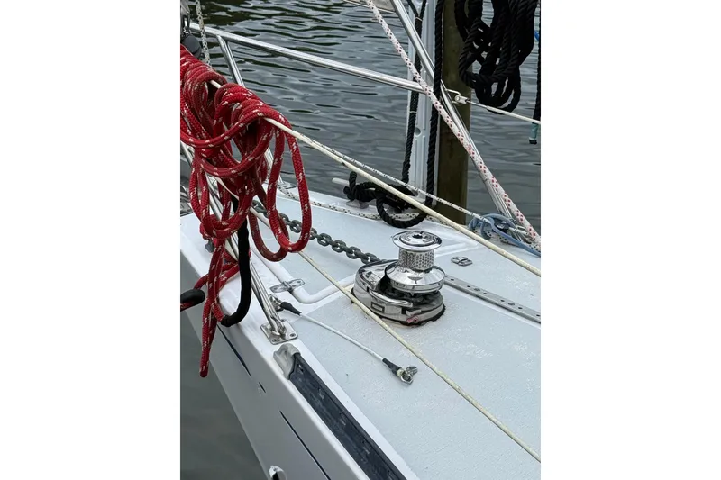Slide: The Image of Deck of 1988 Sparkman & Stephens 36 sailboat with ropes and winch. - 3