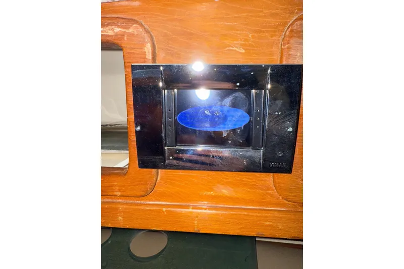 Slide: The Image of Wooden interior detail of a 1988 Sparkman & Stephens 36 yacht with a Vimar panel. - 31