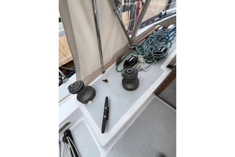 Slide: The Image of Cockpit of 1988 Sparkman & Stephens 36 sailboat with winches and ropes. - 44