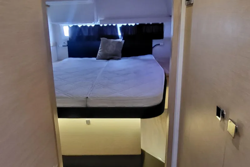 Slide: The Image of Luxurious cabin interior of 2018 Fountaine Pajot Helia 44 catamaran with cozy bed. - 11