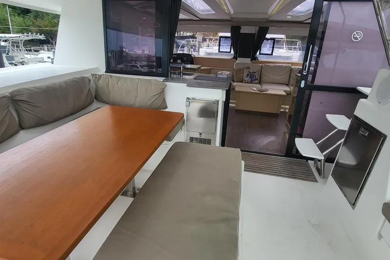 Slide: The Image of Interior view of 2018 Fountaine Pajot Helia 44 catamaran with seating and dining area. - 16