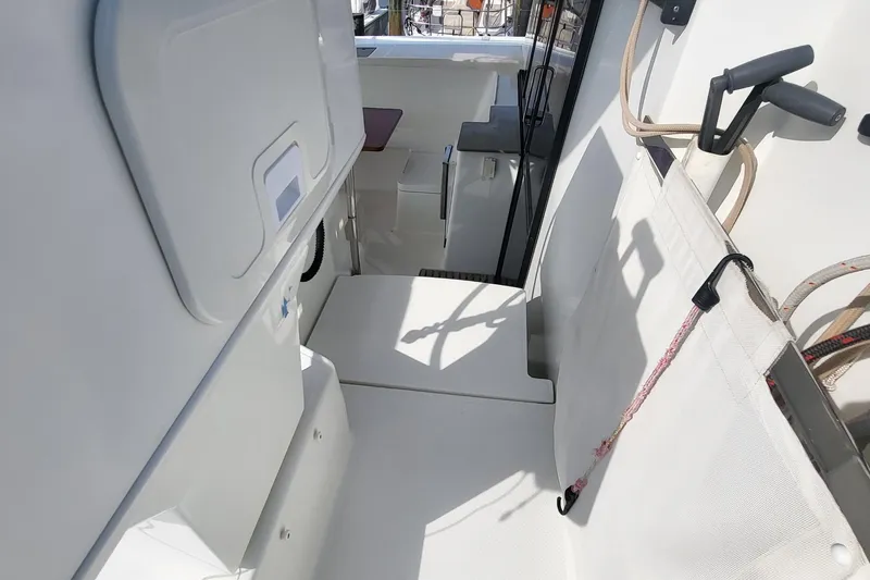 Slide: The Image of 2018 Fountaine Pajot Helia 44 yacht interior with seating and storage area. - 35