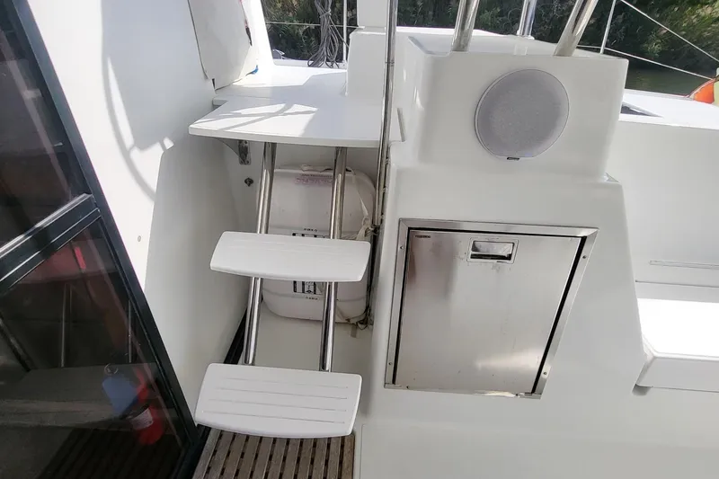 Slide: The Image of 2018 Fountaine Pajot Helia 44 yacht interior with steps, storage, and speaker. - 36