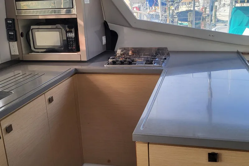 Slide: The Image of Modern kitchen interior of 2018 Fountaine Pajot Helia 44 catamaran with stove and microwave. - 43