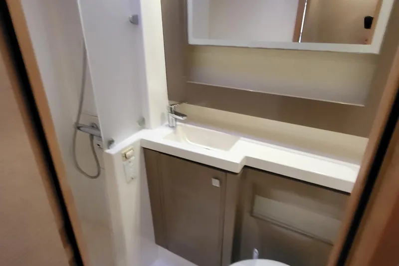 Slide: The Image of Bathroom interior of 2018 Fountaine Pajot Helia 44 catamaran, featuring modern sink and shower. - 5
