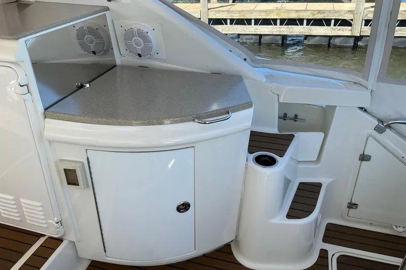 Slide: The Image of 2003 Regal Commodore 4260 yacht interior with sleek cabinetry and modern design. - 28