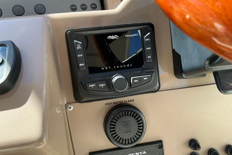 Slide: The Image of Dashboard of a 2003 Regal Commodore 4260 with Wet Sounds audio system. - 34