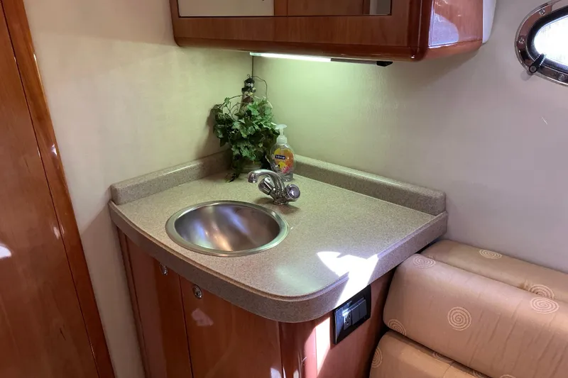 Slide: The Image of 2003 Regal Commodore 4260 yacht interior with sink and countertop. - 63