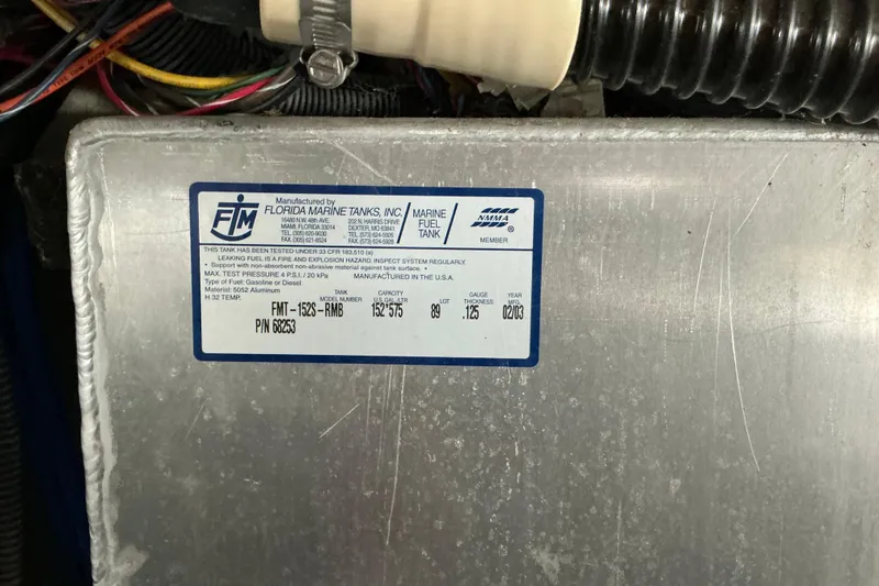 Slide: The Image of Label on Florida Marine Tanks, Inc. fuel tank for 2003 Regal Commodore 4260 boat. - 73