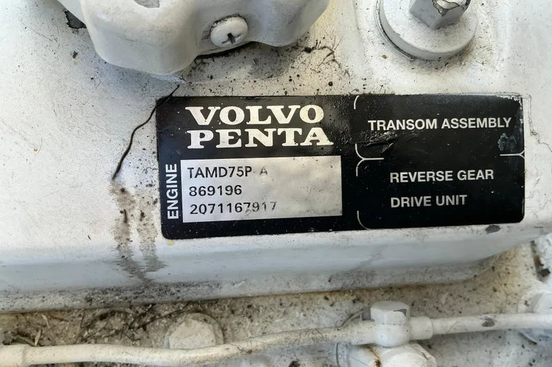 Slide: The Image of Volvo Penta engine label on 2003 Regal Commodore 4260, featuring TAMD75P model details. - 78