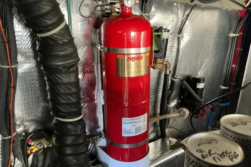 Slide: The Image of Engine room of 2003 Regal Commodore 4260 with Fireboy fire suppression system. - 83