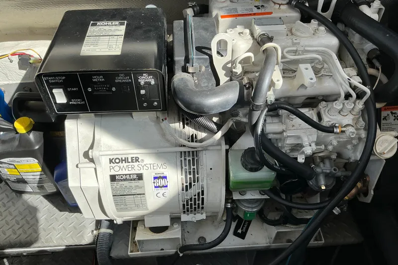 Slide: The Image of Kohler power system in 2003 Regal Commodore 4260 boat engine compartment. - 92
