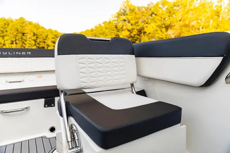 Slide: The Image of 2023 Bayliner VR5 Bowrider OB on trailer, featuring sleek design and powerful outboard motor. - 10