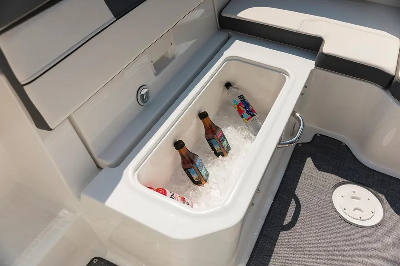 Slide: The Image of 2023 Bayliner VR5 Bowrider OB interior with modern seating and steering console. - 11