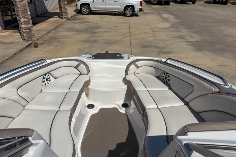 Slide: The Image of 2013 Yamaha Boats SX240 HO interior with spacious seating and modern design. - 13