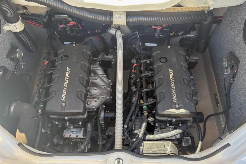 Slide: The Image of 2013 Yamaha SX240 HO boat engine compartment with dual high output engines. - 5