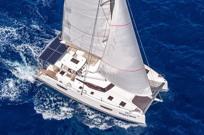 Slide: The Image of 2020 Fountaine Pajot Saona 47 sailing on vibrant blue ocean waters. - 14