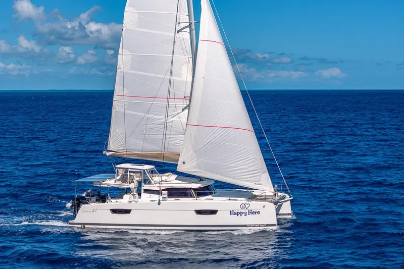 Slide: The Image of 2020 Fountaine Pajot Saona 47 sailing on open blue ocean under clear skies. - 15