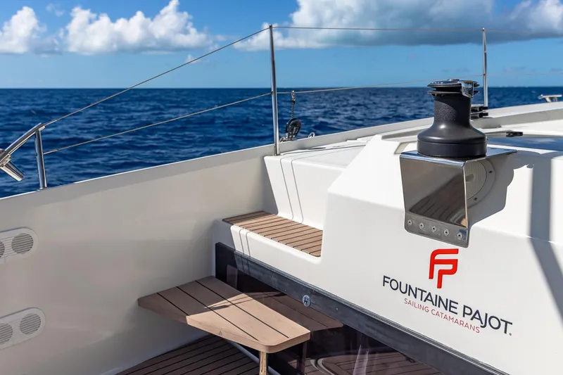 Slide: The Image of 2020 Fountaine Pajot Saona 47 catamaran deck with ocean view and clear skies. - 24