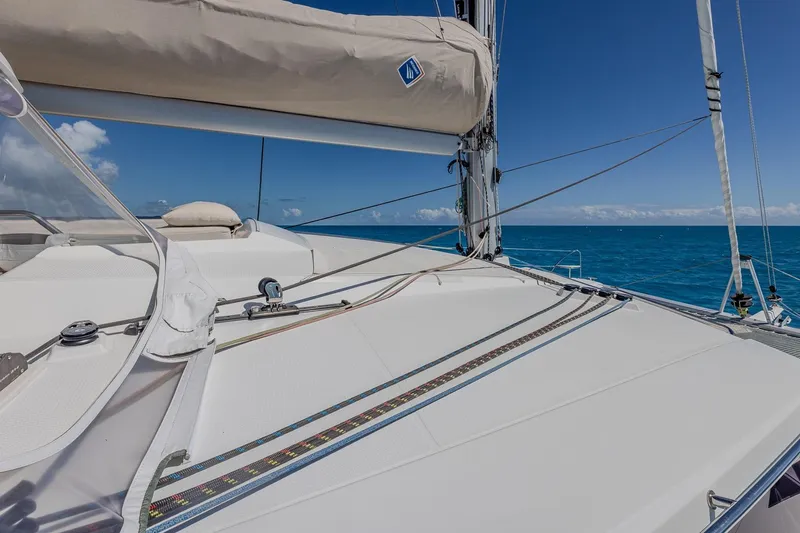 Slide: The Image of 2020 Fountaine Pajot Saona 47 catamaran deck with ocean view and clear skies. - 33